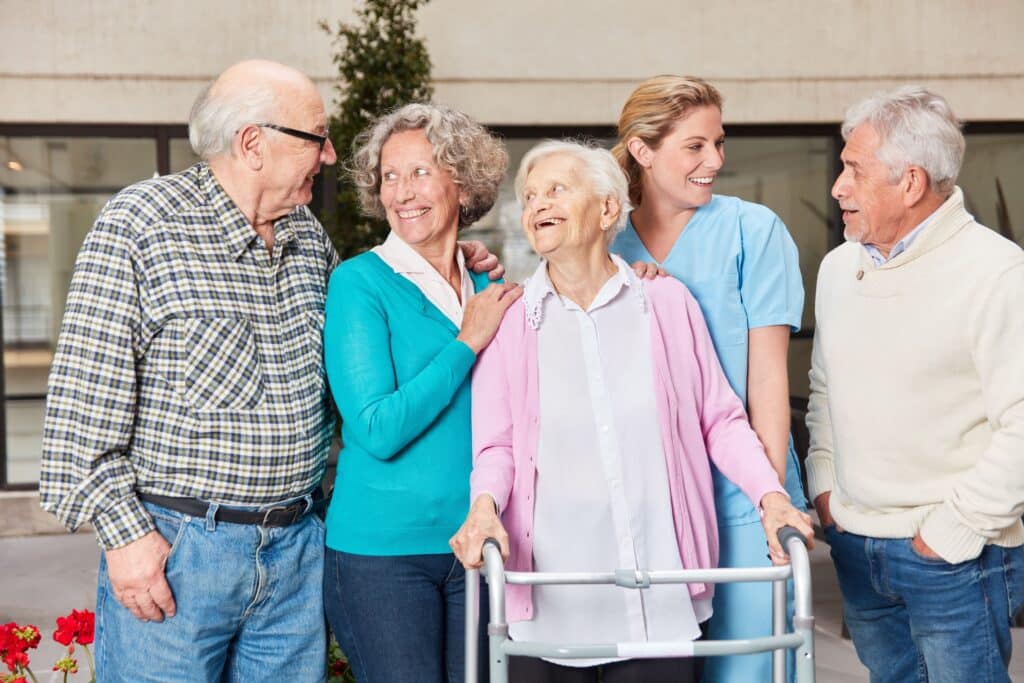 Group of seniors and one caregiver