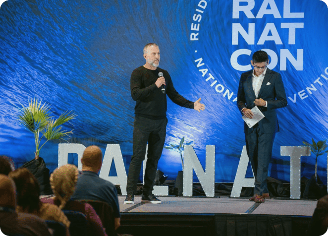 Scott speaking on stage